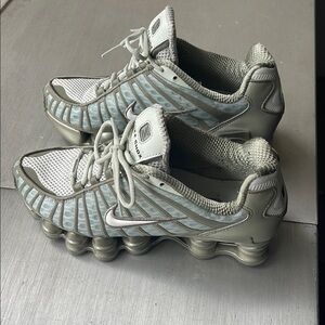 Used (no box ) Nike Shox TL in Silver, Army  and White Sneakers Women’s size 7.